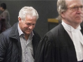 Tony Accurso, left, with his lawyer Louis Belleau at Palais de Justice February 16, 2015.