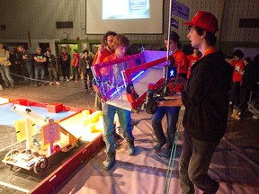 Team members of Collège Bois-de-Boulogne get ready for one of their preliminary heats during the robotics competition at Vanier College in 2012.
