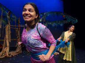 Anjali (Natalia Gracious), left, and Ajji (Rachelle Ganesh) during a scene from the media call of the Geordie Productions presentation of Beneath The Banyan Tree at The Centaur Theatre in Montreal, on Thursday, Feb. 19, 2015.