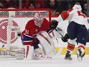 Florida Panthers Dave Bolland fires the game-winning shot past Montreal Canadiens Carey Price during shootout of National Hockey League game in Montreal Thursday February 19, 2015.