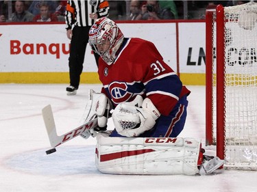 Montreal Canadiens Carey Price makes a save against the Florida Panthers during second period of National Hockey League game in Montreal Thursday February 19, 2015.