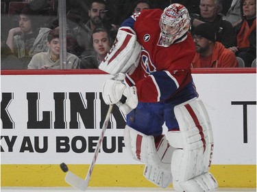 Montreal Canadiens goalie Carey Price skates out of his net to clear the puck away from Florida Panthers during second period of National Hockey League game in Montreal Thursday February 19, 2015.