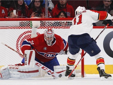 Montreal Canadiens goalie Carey Price makes save on shootout attempt by Florida Panthers Jonathan Huberdeau during National Hockey League game in Montreal Thursday February 19, 2015.