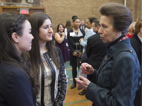 Princess Anne speaks to recipients of the Duke of Edinburgh's Awards, Kendra Tatemichi, left, and Daniela Ferrari, centre, at Lower Canada College in Montreal on Thursday February 19, 2015.