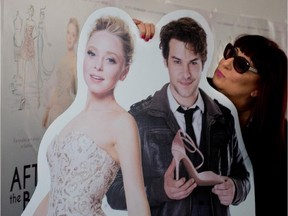 Jane Silverstone-Segal, CEO of Le Chateau and a producer of After The Ball, poses with a cutout of the movie poster in her offices in Montreal on Friday, February 20, 2015.