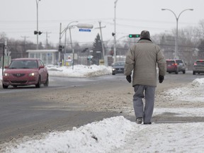 A senior walks along Hymus in Kirkland, on Saturday, February 21, 2015. One in four seniors in that area lives alone.