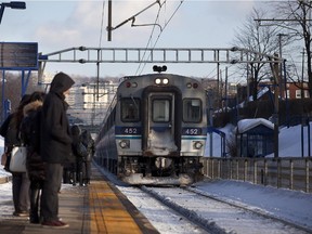 Train passes at the AMT station in Town of Mount-Royal, in Montreal, Wednesday Feb. 25, 2015.