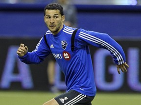 Dilly Duka gets into position during Impact practice at the Olympic Stadium in Montreal on Feb. 27, 2015.