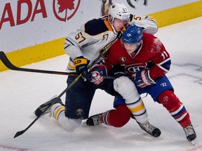 Buffalo Sabres defenceman Tyler Myers battles for position with Canadiens forward Brendan Gallagher during game at the Bell Centre in Montreal on Feb. 3, 2015.