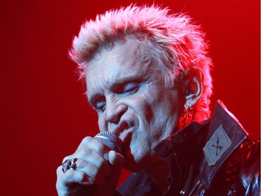 Veteran rocker Billy Idol gives one of his trademark snarls at the Metropolis in Montreal Tuesday, February 3, 2015. He's touring behind his first album in eight years, Kings and Queens of the Underground.