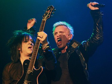 Veteran rocker Billy Idol (right) appreciates guitarist Steve Stevens' playing at the Metropolis in Montreal Tuesday, February 3, 2015. He's touring behind his first album in eight years, Kings and Queens of the Underground.
