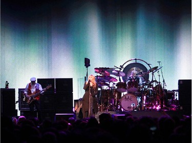 From the left John McVie, Stevie Nicks and Mick Fleetwood of Fleetwood Mac perform at the Bell Centre in Montreal, on Thursday, February 5, 2015.
