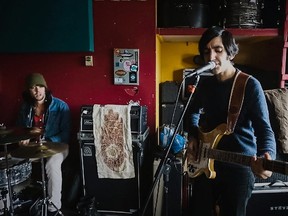 Elephant Stone bassist and vocalist Rishi Dhir, right, and drummer Miles Dupire, left, rehearse a song at their practice space in Montreal on Sunday, January 20, 2013.