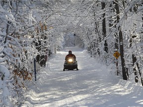 A snowmobiler braves the cold in the Eastern Townships