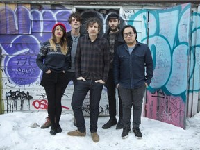 "In the end, we felt the album was in continuity with everything we've done over the years," says Trevor Anderson, centre, who co-founded the band with Robbie MacArthur, second from left. Also pictured: Sheenah Ko, Max Hébert and Charles Pham-Dang, far right. Go to montrealgazette.com to watch a video of the band performing the track Desert Tribe.