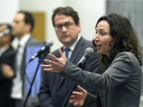 Parti Québécois leadership candidate Martine Ouellet, right, speaks during a party leadership debate at the Université de Montréal in Montreal, Wednesday January 28, 2015.