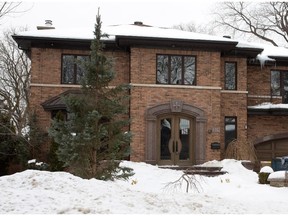 This Town of Mount Royal home was once the home of Michel Henri. Revenue Quebec seized the home and sold it last October after Henri was convicted of fraud. The new owners, not seen, are renovating the property.