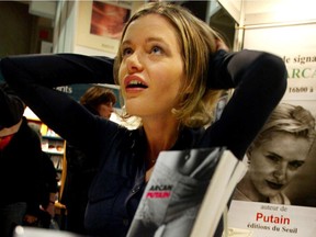 Nelly Arcan, author of Putain, speaks to fans during book signing at the Salon du Livre in Montreal on Saturday, Nov. 16, 2002.