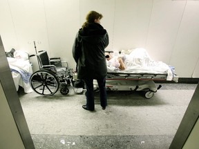 Patients line hallways of a Montreal-area hospital emergency ward in 2007.