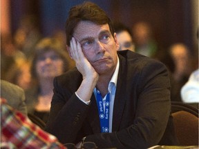Parti Quebecois leadership candidate Pierre Karl Péladeau listens as delegates debate a proposal at the party's national congress Saturday, February 7, 2015 in Laval.