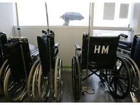 Wheelchairs in a clinic waiting room.