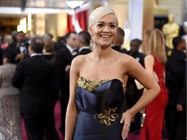 Rita Ora arrives at the Oscars on Sunday, Feb. 22, 2015, at the Dolby Theatre in Los Angeles.
