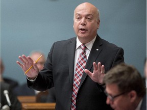 Quebec Transport Minister Robert Poeti responds to Opposition questions Thursday, May 29, 2014 during question period at the legislature in Quebec City.