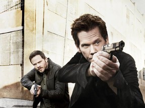 Shawn Ashmore and Kevin Bacon in a scene from The Following, Season 3.