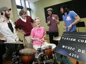At Vanier College, members of the Patrick Watson Band with their music teacher Nadia Turbide, at the drums. Left is Simon Angell, Robbie Kuster, Patrick Watson, and far right, Mishka Stein.