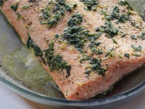 The easiest salmon dinner: roasted, then seasoned with herb-flavoured butter.