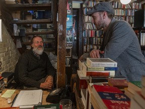 Owner Adrian King-Edwards and his son, Brendan on March 3, 2015, at The Word bookstore at 469 Milton St. The Montreal institution is turning 40 this year.