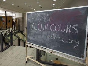 File photo: Sign in UQAM's Faculty of Education building announcing no courses due to a student strike by the student association ADEESE on March 23, 2015.
