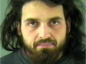 This image provided by the Royal Canadian Mounted Police shows and undated image of Michael Zehaf-Bibeau, 32, who shot a soldier to death at Canada's national war memorial Wednesday, Oct. 22, 2014 and was eventually gunned down inside Parliament by the sergeant-at-arms. (AP Photo/Vancouver Police via The Royal Canadian Mounted Police)