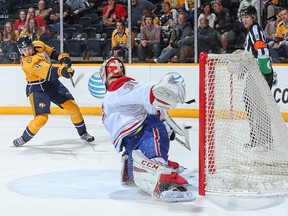Filip Forsberg of the Nashville Predators fires the puck past Canadiens' Carey Price for the overtime winner on March 24, 2015.