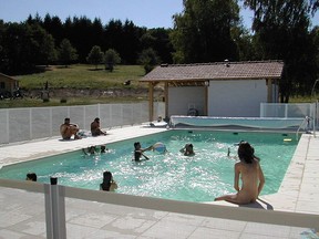 Swimming pool at the Monts de Bussy Naturist camp in France.