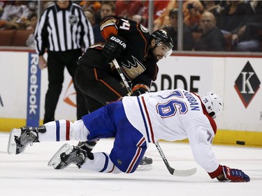 Anaheim Ducks center Nate Thompson, top, shoots past Montreal Canadiens defenseman P.K. Subban during the second period of an NHL hockey game in Anaheim, Calif., Wednesday, March 4, 2015.