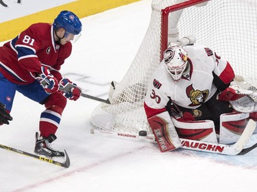 Ottawa Senators goalie Andrew Hammond makes a save on Lars Eller at the Bell Centre on Thursday, March 12, 2015.