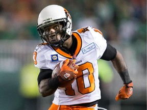 Stefan Logan #10 of the BC Lions carries the ball in a game between the BC Lions and Saskatchewan Roughriders in week 3 of the 2014 CFL season at Mosaic Stadium on July 12, 2014 in Regina, Saskatchewan, Canada.