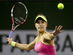 Eugenie Bouchard returns a shot to Lesia Tsurenko of Ukraine during day nine of the BNP Paribas Open at the Indian Wells Tennis Garden on March 17, 2015 in Indian Wells, California.
