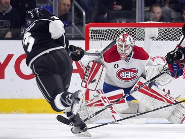 Los Angeles Kings defenceman Brayden McNabb shoots the puck at Montreal Canadiens goalie Dustin Tokarski during the first period of an NHL hockey game, Thursday, March 5, 2015, in Los Angeles.