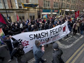 Demonstrators attend a counter-protest held adjacent to a protest by the UK branch of the German group 'Pegida', in the city centre of Newcastle upon Tyne, Northern England on February 28, 2015.The German-based PEGIDA movement, which opposes what it calls the "Islamisation" of Europe, was staging its first demonstration on British soil on Saturday.