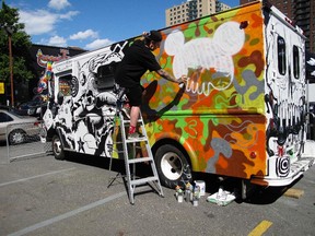 A mural in progress is seen on the side of a van during the Mural Festival on June 6, 2013 in Montreal, Canada. The festival is the first of its kind in Canada, an open-air museum feturing work by some 35 artists from around the world.
