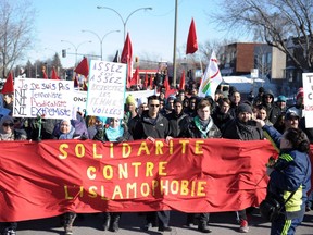 Anti-Islamophobia demonstrators march in Montreal on March 28, 2015, against  sympathizers of the German based anti-Islam group PEGIDA (Patriotic Europeans Against the Islamisation of the West) that were planning a rally against Muslims. PEGIDA cancelled their march after the large turnout against them.