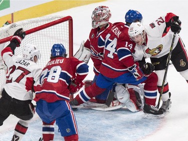 Ottawa Senators' Erik Condra, right, scores on Carey Price during second- period action at the Bell Centre  on Thursday, March 12, 2015 in Montreal.