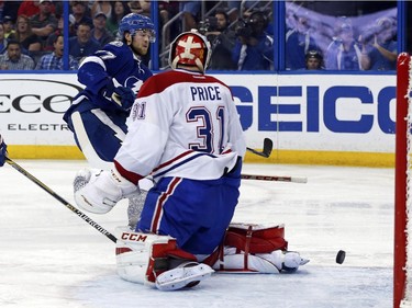 Tampa Bay Lightning's Victor Hedman, of Sweden, scores past Montreal Canadiens goalie Carey Price during the second period Monday, March 16, 2015, in Tampa, Fla.
