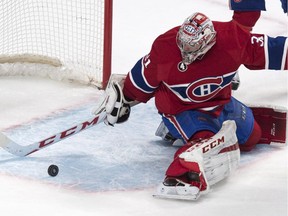 Canadiens goalie Carey Price stops a rolling puck en route to 4-0 shutout victory over the Toronto Maple Leafs at the Bell Centre on Feb. 28, 2015.