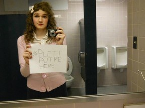 Caroline Trottier-Gascon, a trans advocate at the Université de Montréal, protests against a "bathroom" amendment to Bill C-279 in a men's washroom in Montreal.