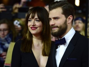 Dakota Johnson and Jamie Dornan at the 65th Berlin International Film Festival Berlinale on February 11, 2015. Both signed three-picture deals but now are trying to renegotiate, with seven-figure paydays in mind.