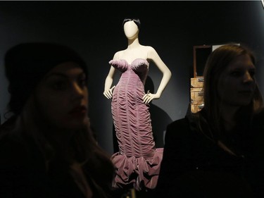 A dress of the "Classé X" collection is displayed during the exhibition devoted to French fashion designer Jean Paul Gaultier on March 30, 2015 in Paris. Jean Paul Gaultier exhibition is at the grand Palais from April , to August 3, 2015.