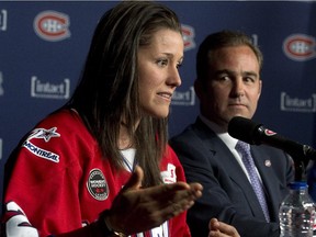 Montreal Stars player Charline Labonte speaks to the media as Montreal Canadiens chief executive Geoff Molson looks on during a news conference Thursday, March 19, 2015 in Montreal. The Montreal Canadiens announced a partnership agreement with the Montreal Stars of the Canadian Women's Hockey League.THE CANADIAN PRESS/Ryan Remiorz